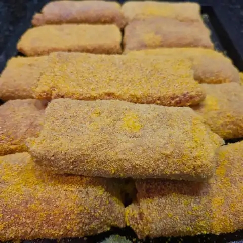 Gepaneerde schnitzels op de toog